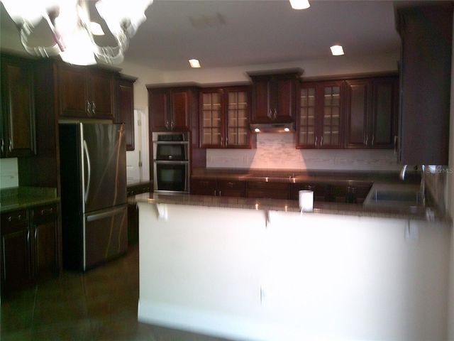 3026 ANQUILLA AVENUE, Clermont, FL 34711