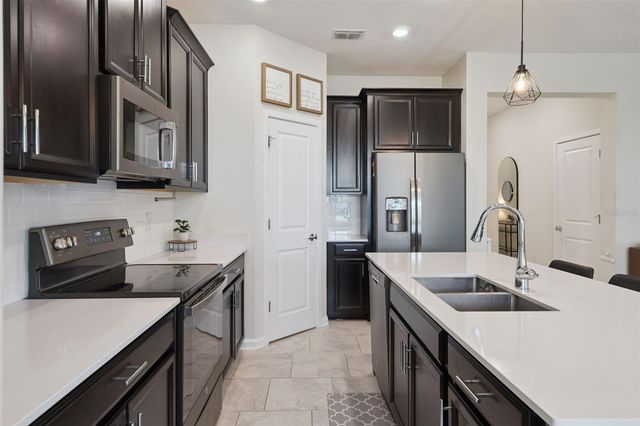 897 CARMILLION COURT, Groveland, FL 34736