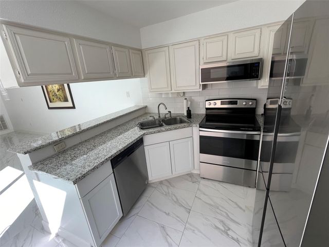 12255 W Village Drive E, Houston, TX 77039