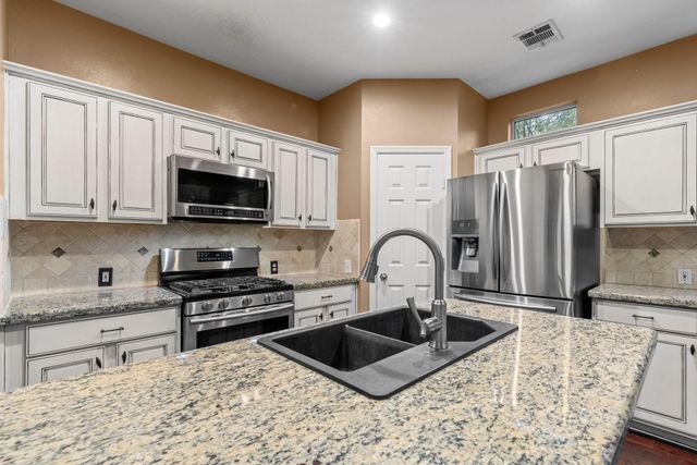 70 Harvest Wind Place, The Woodlands, TX 77382