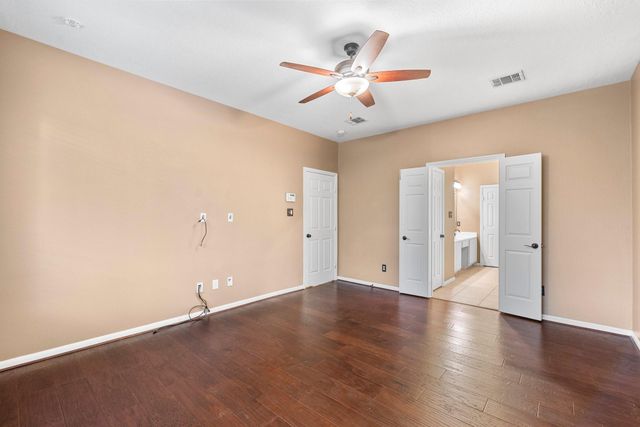 70 Harvest Wind Place, The Woodlands, TX 77382