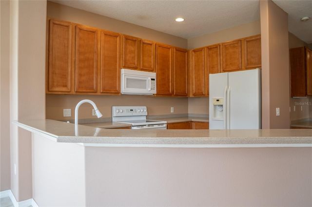 3103 ANQUILLA AVENUE, Clermont, FL 34711