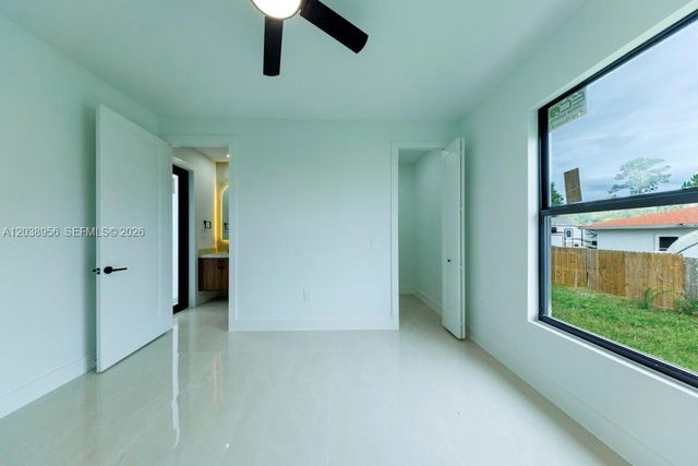 814 Calyton Avenue, Lehigh Acres, FL 33972