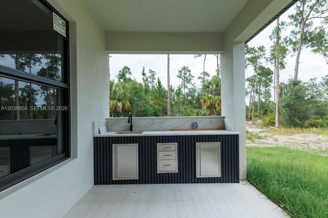 814 Calyton Avenue, Lehigh Acres, FL 33972