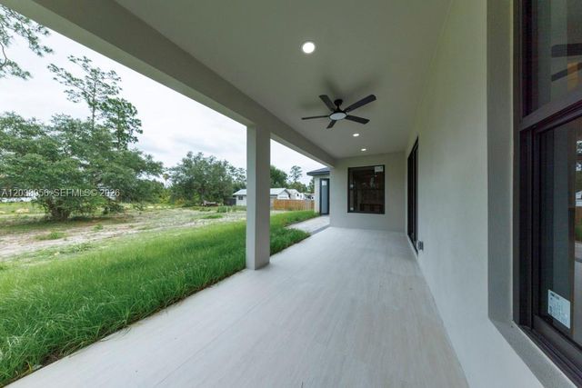 814 Calyton Avenue, Lehigh Acres, FL 33972