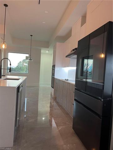 2594 43rd AVE NE, Naples, FL 34120