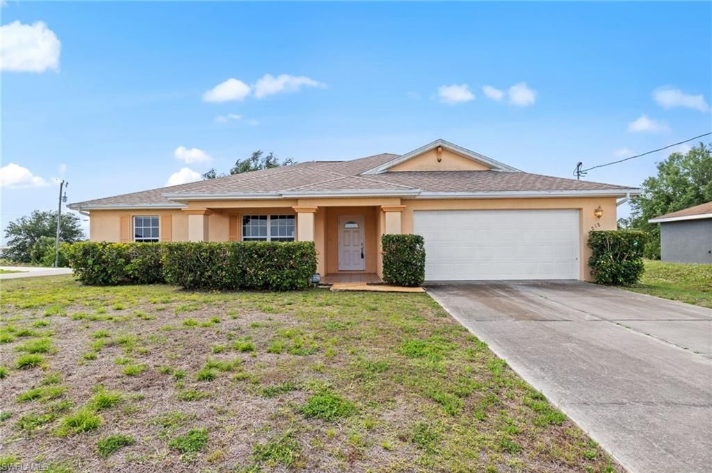 218 Pembroke ST, Lehigh Acres, FL 33974