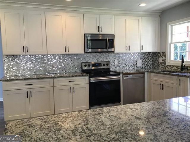 3021 STONE MOUNTAIN Street, Lithonia, GA 30058