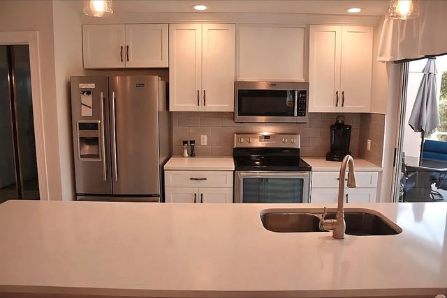 1101 Sun Terrace Court, Palm Beach Gardens, FL 33403