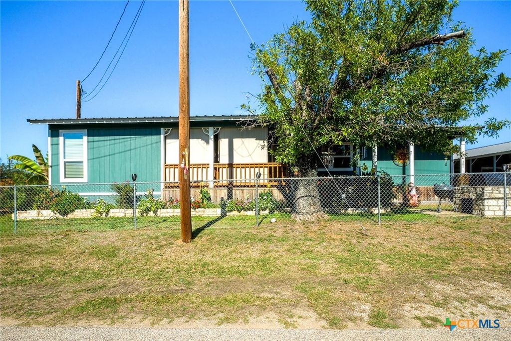 Image 1 of property listing at 301 E Castlebriar Drive, Granite Shoals, TX 78654