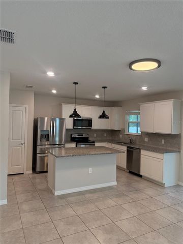 1042 MICHELANGELO LANE, Winter Haven, FL 33884