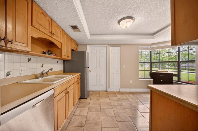 12584 WEDGEFIELD DRIVE, Grand Island, FL 32735