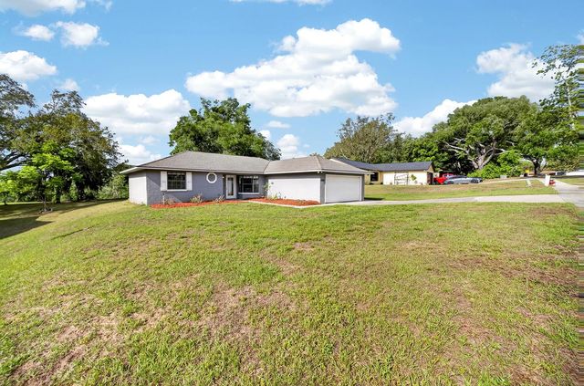 12584 WEDGEFIELD DRIVE, Grand Island, FL 32735