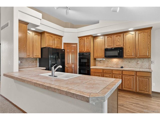 9823 Pebble Beach Ln, Lone Tree, CO 80124