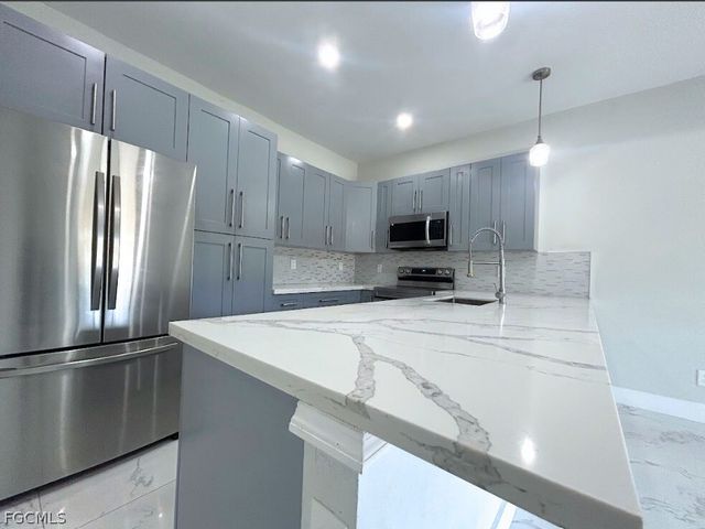 398 Pennfield AVE, Lehigh Acres, FL 33974