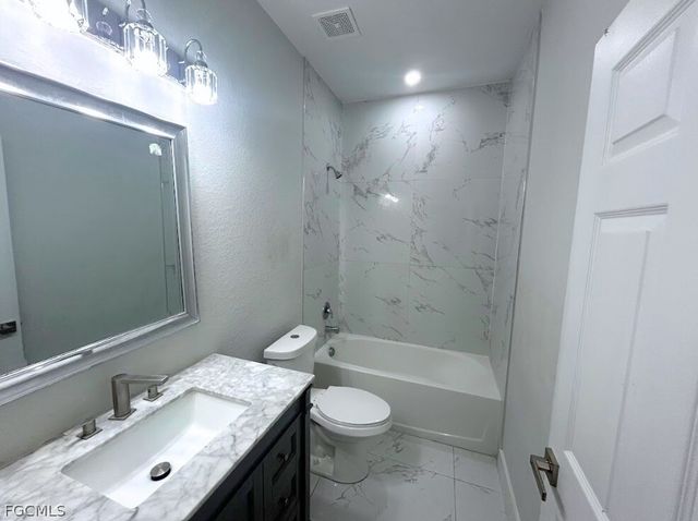 398 Pennfield AVE, Lehigh Acres, FL 33974