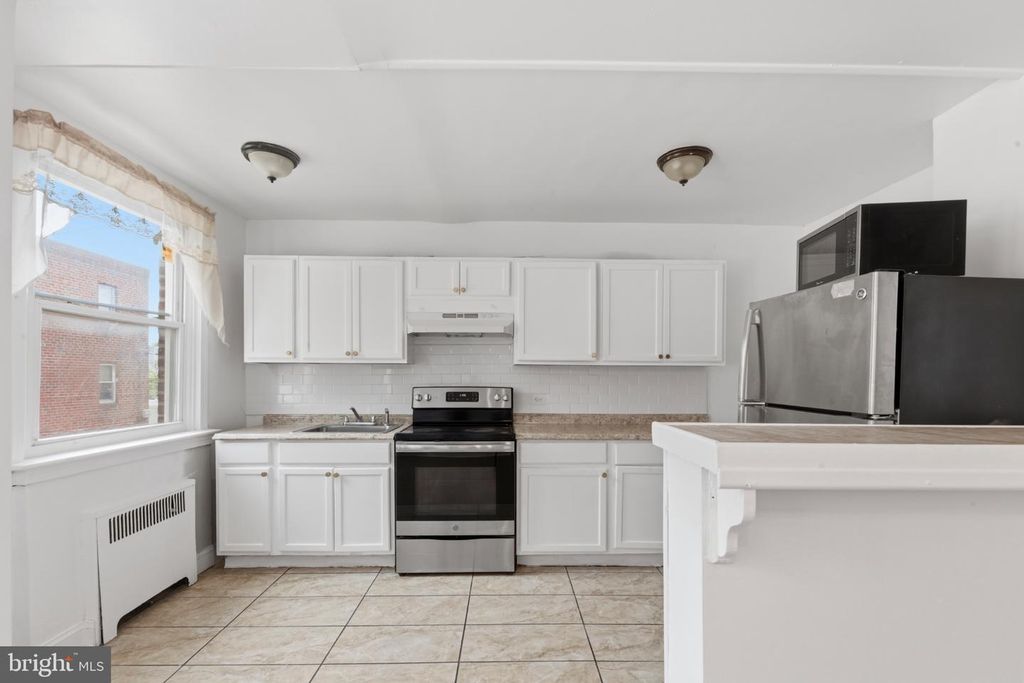 559 E COMLY ST, PHILADELPHIA, PA 19120 — photo 5