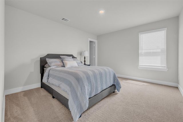 9702 Migrant Hawker Court, Conroe, TX 77385