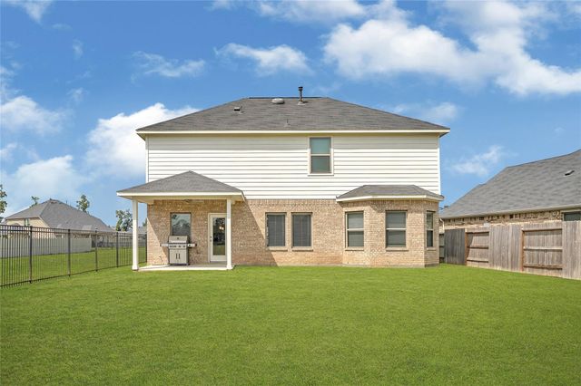 9702 Migrant Hawker Court, Conroe, TX 77385