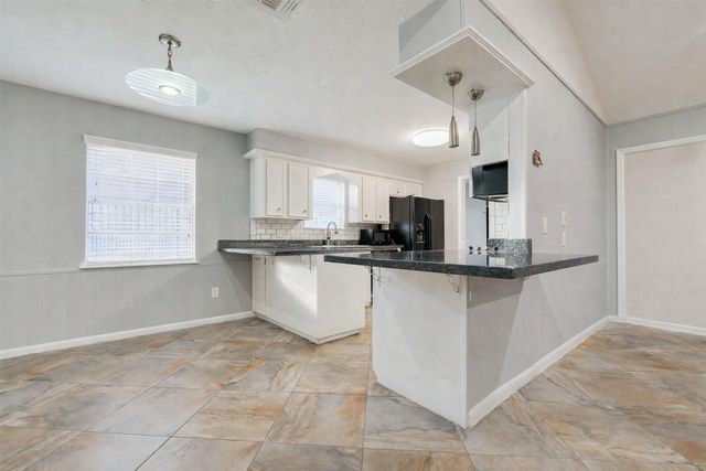 9223 Sandstone Street, Houston, TX 77036