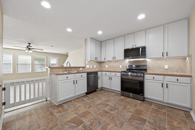 9940 Swallow Drive, Conroe, TX 77385