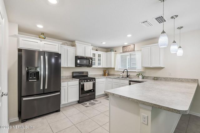 11800 FLOWERING PEACH Court, Jacksonville, FL 32256