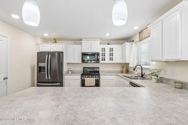 11800 FLOWERING PEACH Court, Jacksonville, FL 32256