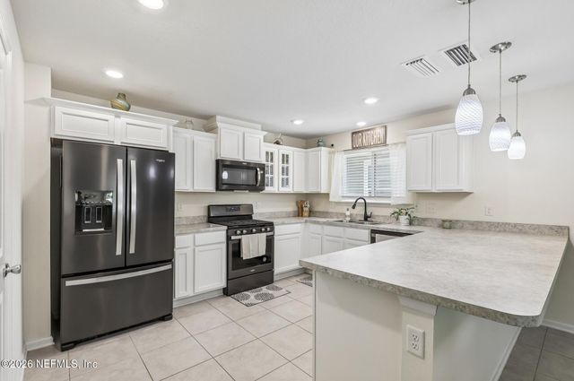 11800 FLOWERING PEACH Court, Jacksonville, FL 32256