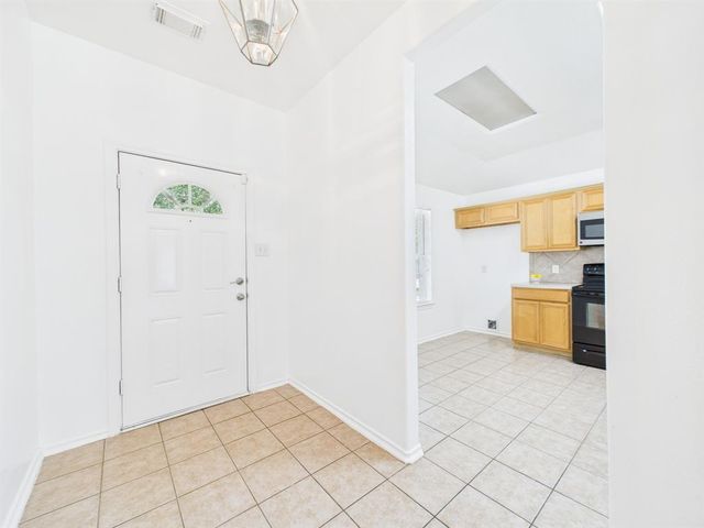 26940 Carriage Manor Lane, Kingwood, TX 77339