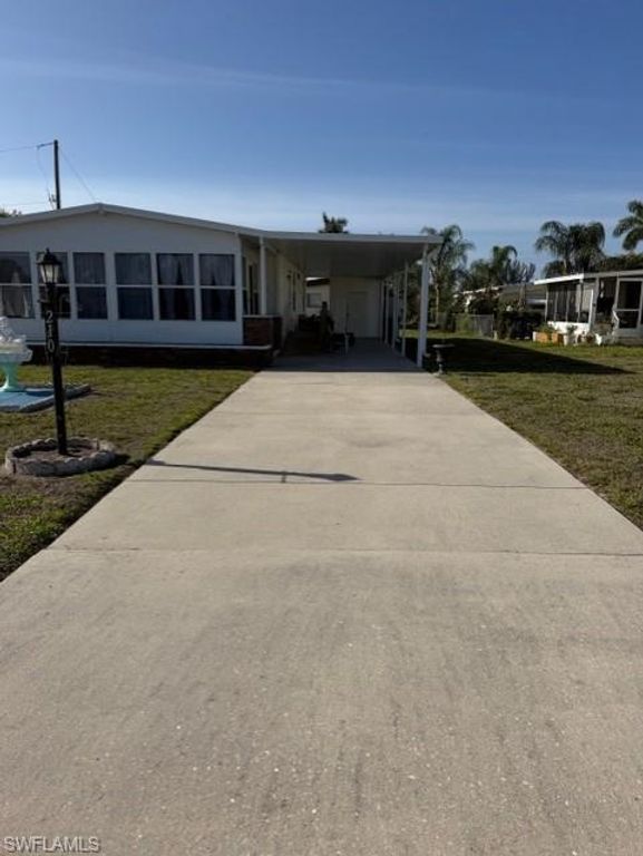 210 Pine Key LN 210, NAPLES, FL 34114 — photo 2