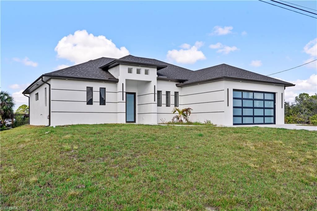 912 Bell BLVD S, LEHIGH ACRES, FL 33974 — exterior