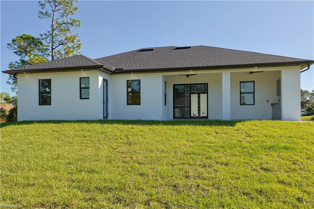 912 Bell BLVD S, LEHIGH ACRES, FL 33974 — photo 4