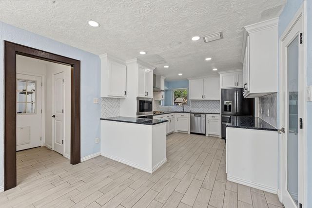 5911 Sandypine Court, Spring, TX 77379