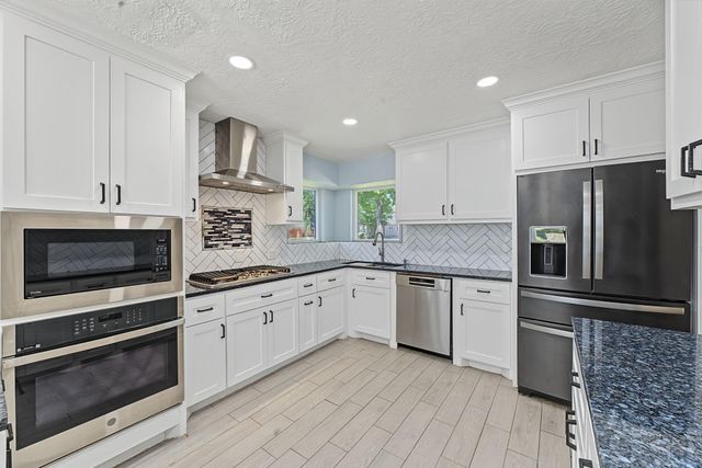 5911 Sandypine Court, Spring, TX 77379