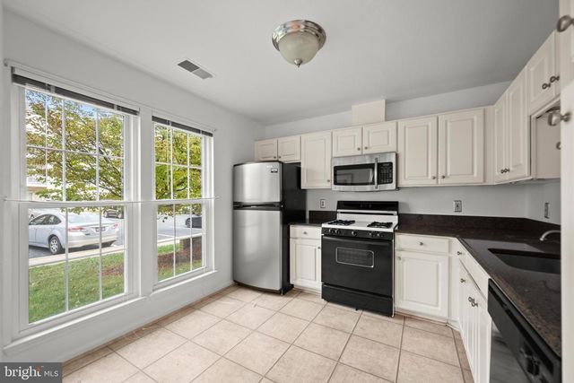 5951 MILLRACE CT #C-104, Columbia, MD 21045