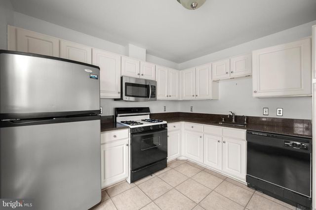 5951 MILLRACE CT #C-104, Columbia, MD 21045