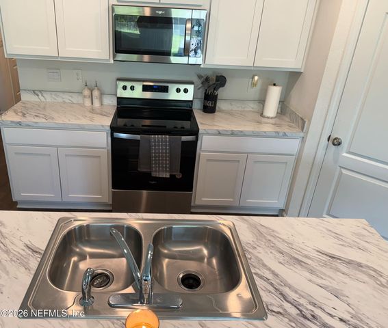 65183 FOREST GLEN Lane, Yulee, FL 32097
