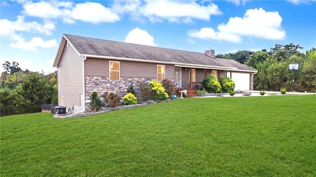 12373 Georgia Hills Drive, Gravette, AR 72736