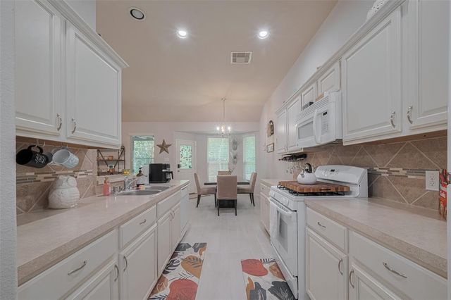 9459 E Woodmark, Conroe, TX 77304
