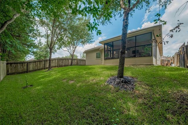 9459 E Woodmark, Conroe, TX 77304