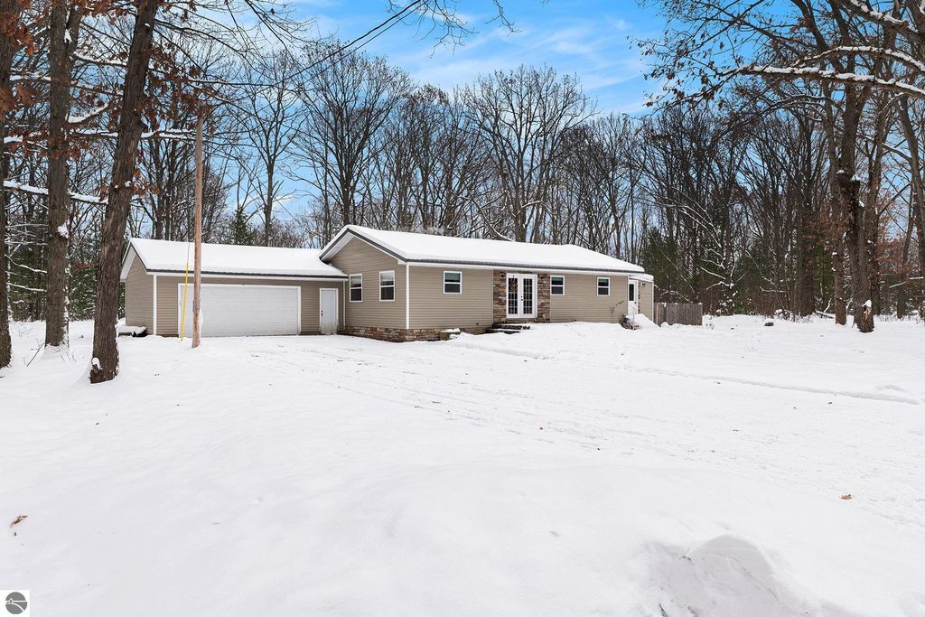 Image 2 of property listing at 1821 Rogers Road, Grawn, MI 49637