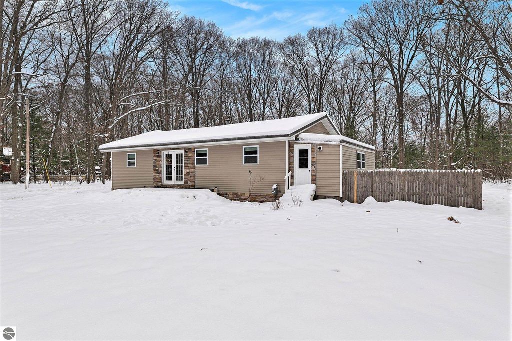 Image 30 of property listing at 1821 Rogers Road, Grawn, MI 49637
