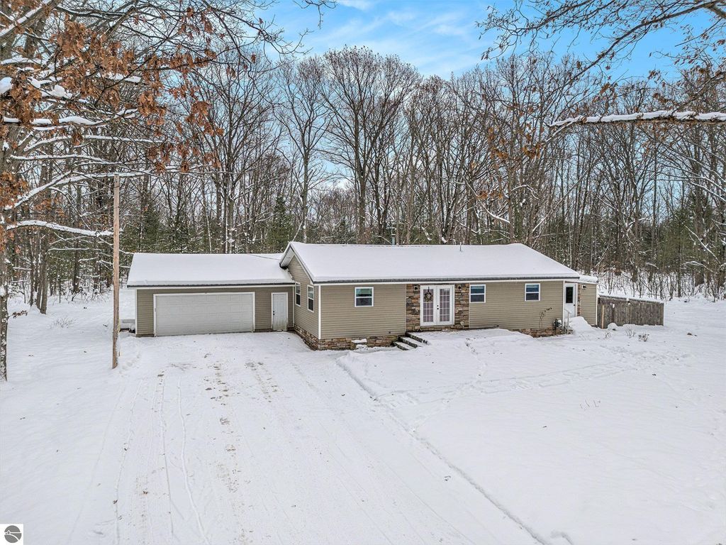 Image 34 of property listing at 1821 Rogers Road, Grawn, MI 49637