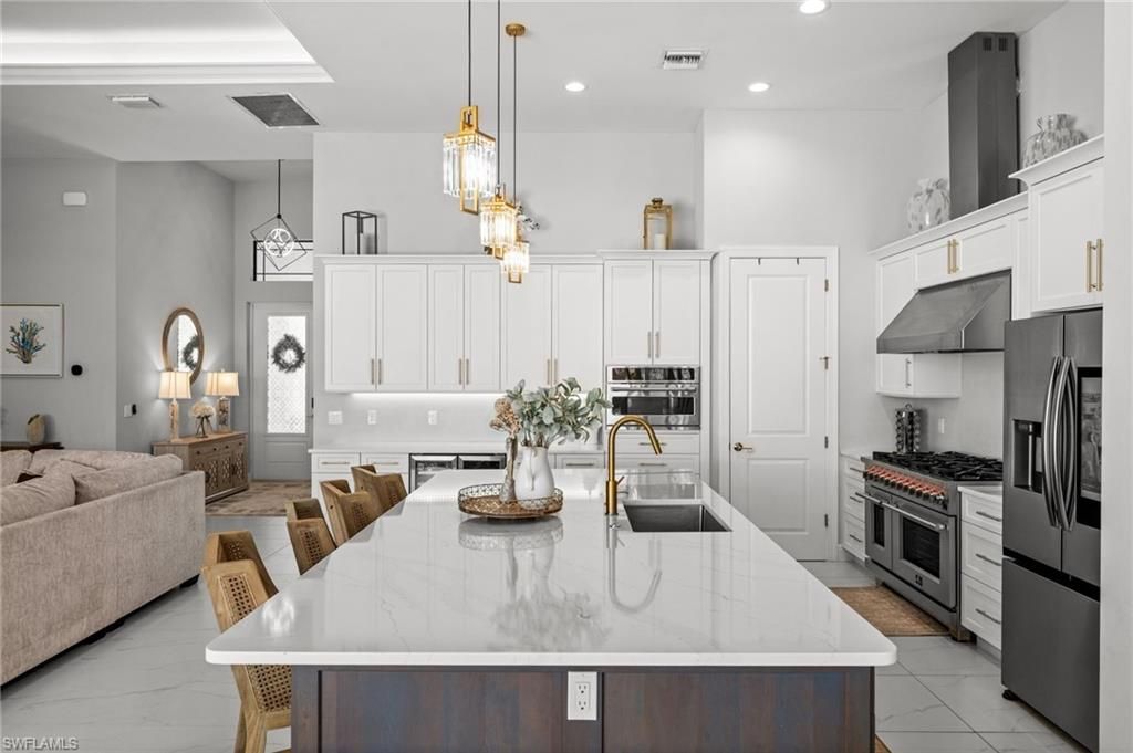 Image 18 of property listing at 1418 NW 37th PL, Cape Coral, FL 33993