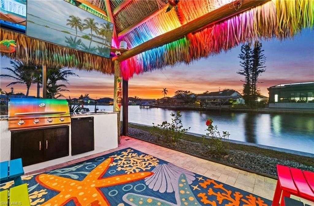 Image 3 of property listing at 1418 NW 37th PL, Cape Coral, FL 33993