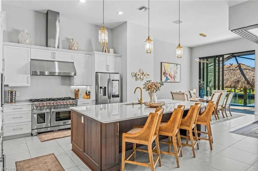 Image 4 of property listing at 1418 NW 37th PL, Cape Coral, FL 33993