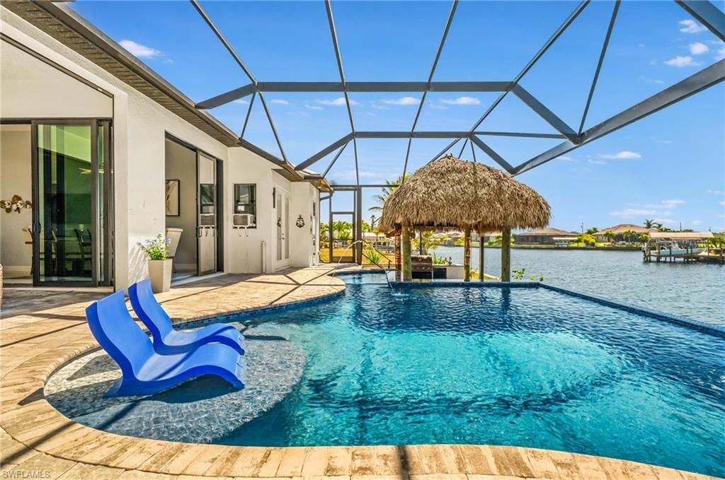 Image 6 of property listing at 1418 NW 37th PL, Cape Coral, FL 33993