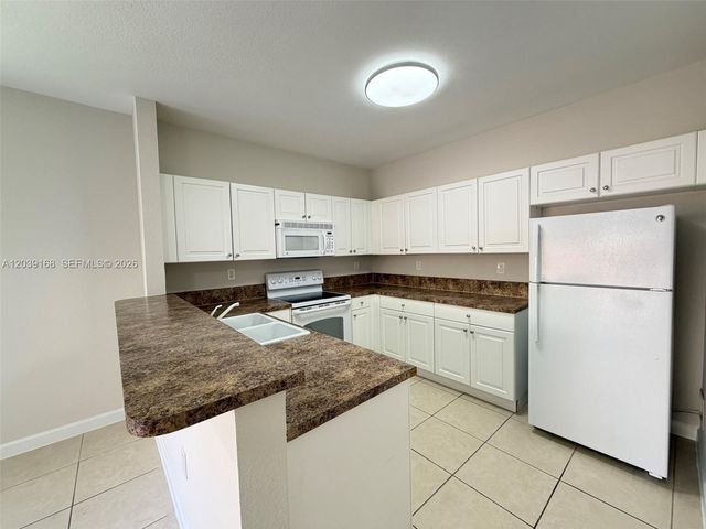 1720 NE 33rd Ave 102-5, Homestead, FL 33033