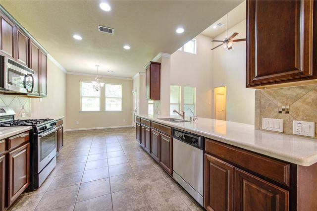 15727 Whisper Woods Drive, Cypress, TX 77429