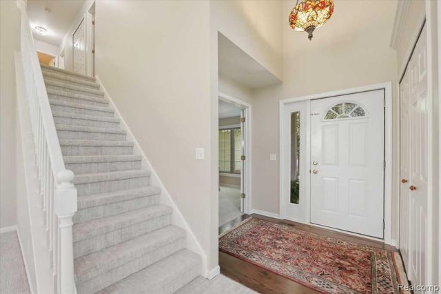 7042 Autumn Wood Drive, Hamburg Township, MI 48116